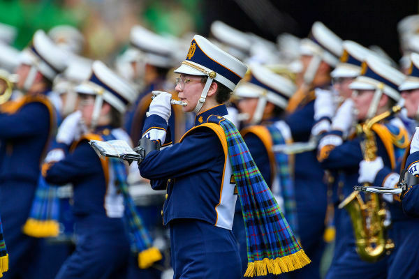 The Notre Dame Marching Band Performs At A Football Game